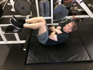 crunches with hands on chest